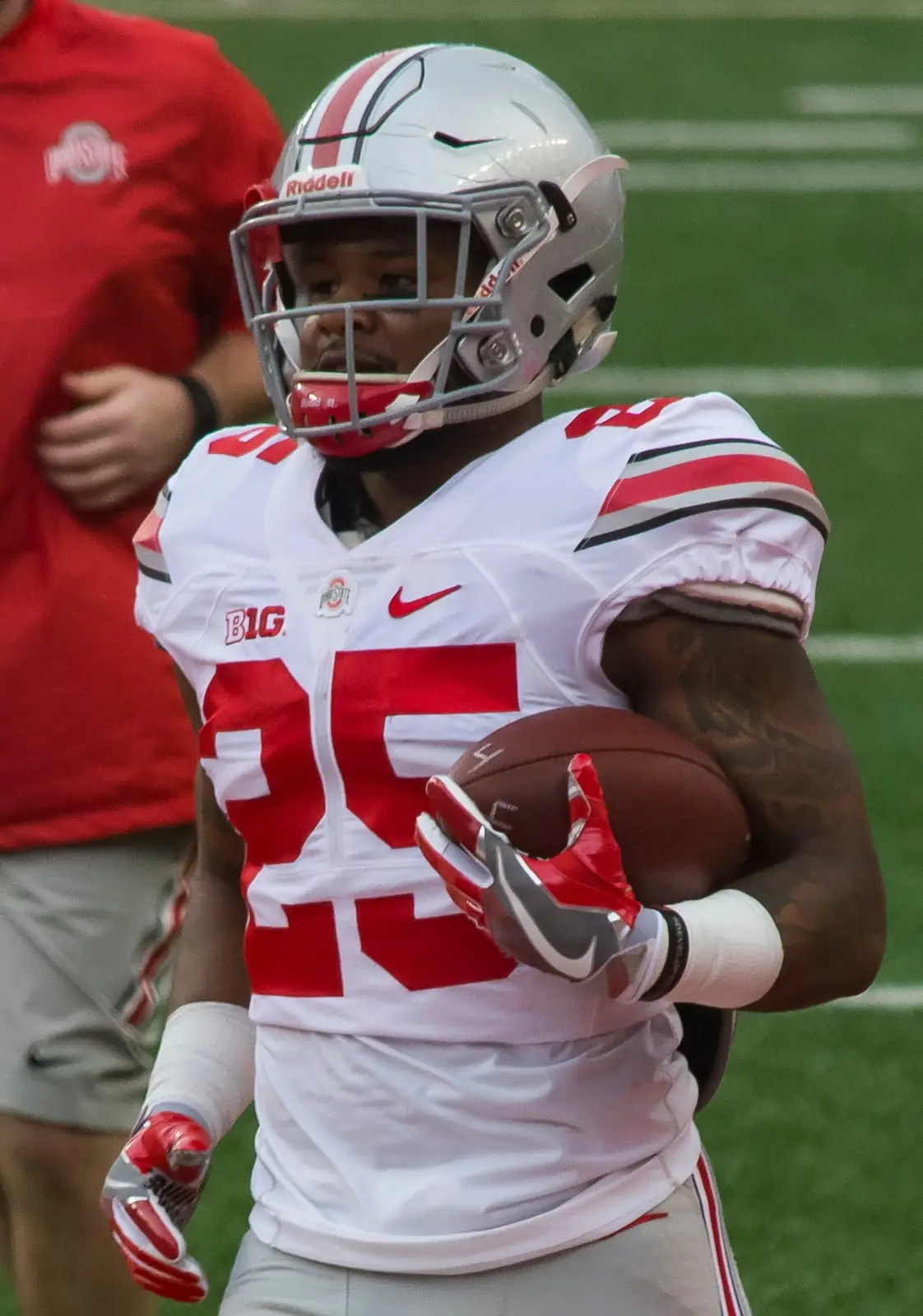 Ohio State running back Mike Weber carrying a football during warmups