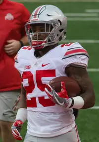 Ohio State running back Mike Weber carrying a football during warmups