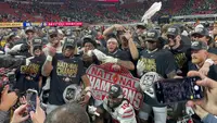 Ohio State players gathered on the field celebrating the CFP national championship