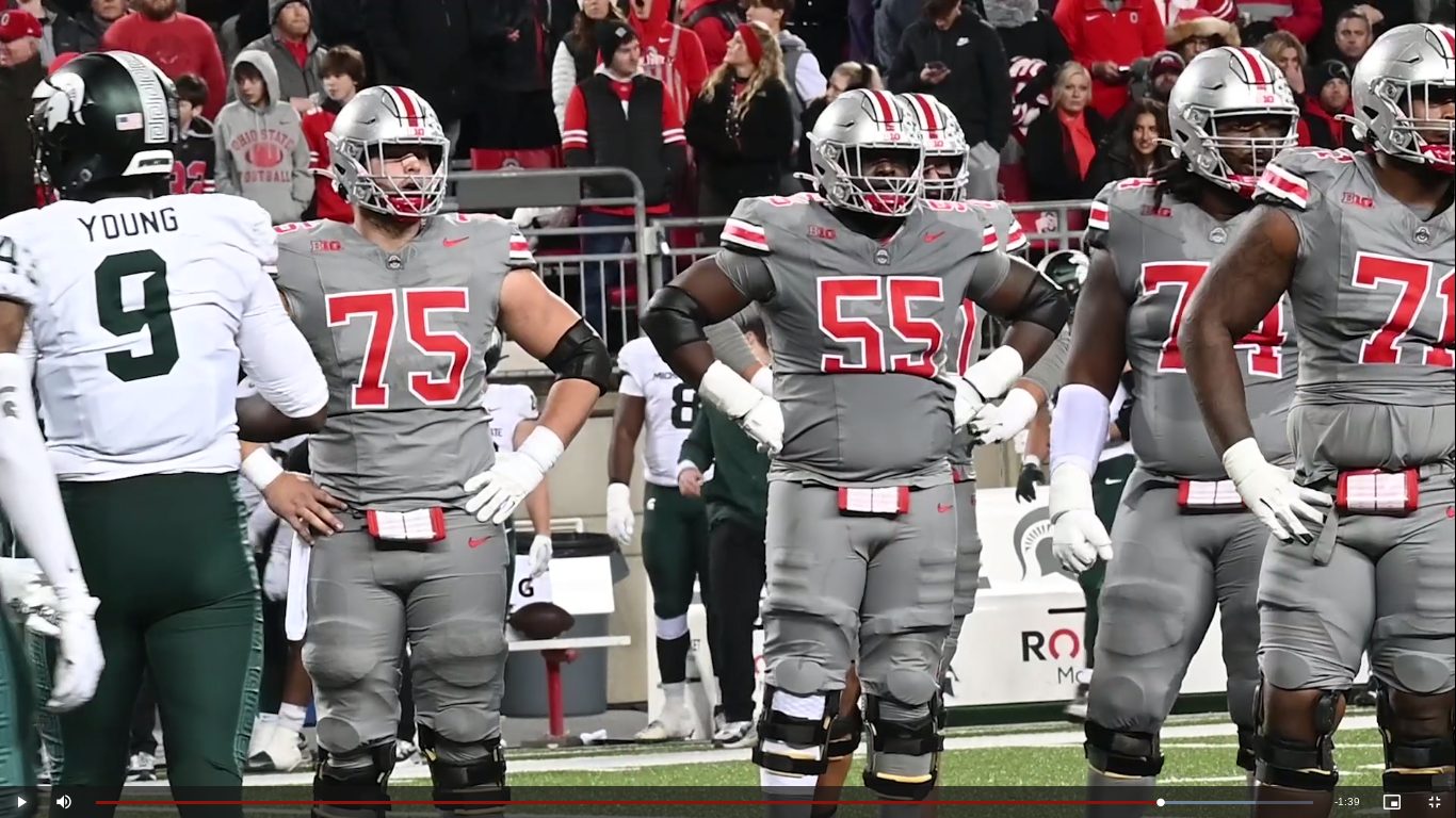 Ohio State offensive linemen set at the line of scrimmage